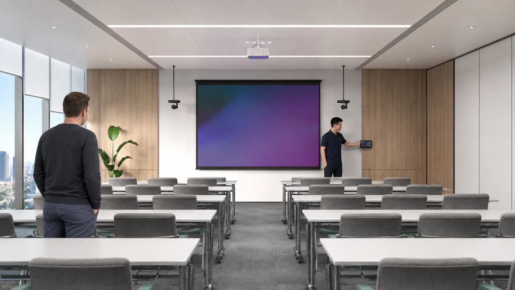 C9 GROUP staff member preparing a Microsoft 365 adoption and training room