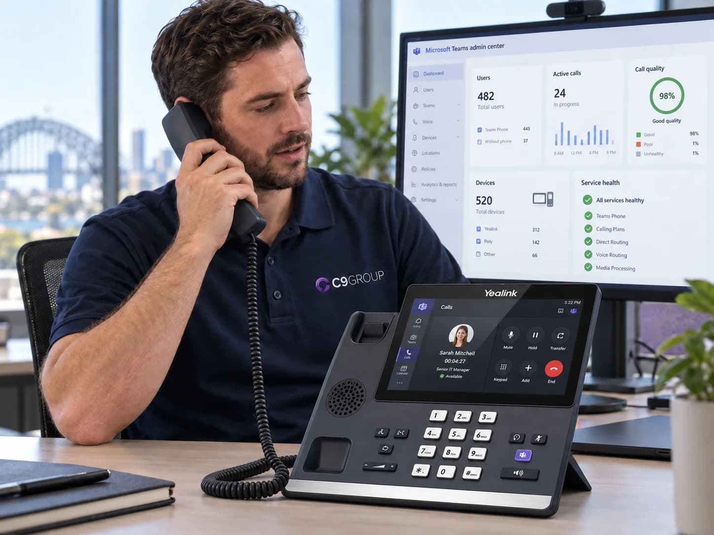 C9 GROUP staff member reviewing Microsoft Teams Phone requirements with business hardware