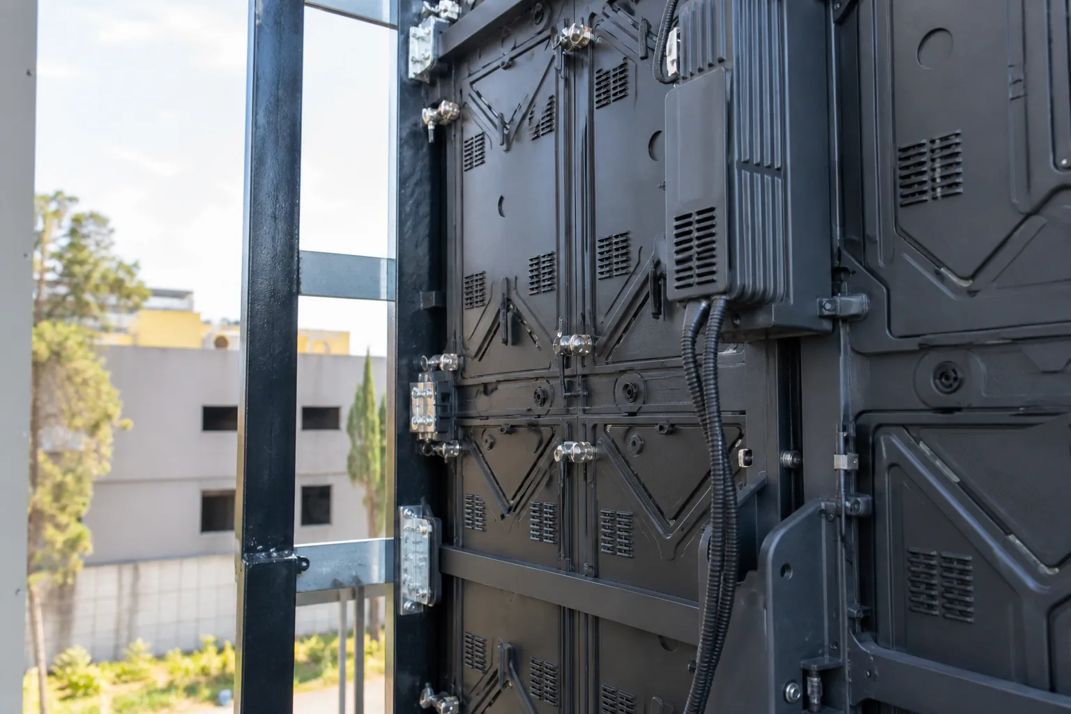 Close-up of outdoor LED cabinet structure, ventilation and service access